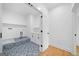 Functional laundry room featuring modern tile, clean cabinets and spacious design at 103 Maddox Rd, Buford, GA 30518