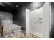 Modern bedroom adjacent to a spacious laundry room at 103 Maddox Rd, Buford, GA 30518