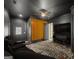 Contemporary living room with movie seating and accent wall at 103 Maddox Rd, Buford, GA 30518