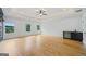 Large main bedroom with hardwood floors, and views of the backyard at 103 Maddox Rd, Buford, GA 30518