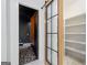 A spacious office features a modern barn door and patterned flooring at 103 Maddox Rd, Buford, GA 30518
