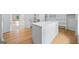 Bright walk-in closet with custom shelves and center island offers ample storage space at 103 Maddox Rd, Buford, GA 30518