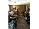 Basement featuring wood paneling, comfortable seating, and entertainment setup, perfect for relaxation or recreation at 90 Cabriolet Trail, Mcdonough, GA 30253