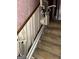 Carpeted stairs fitted with a stair lift for easy access between floors, offering comfort and convenience at 90 Cabriolet Trail, Mcdonough, GA 30253
