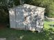 Outdoor storage shed with double doors and a simple design, ideal for storing gardening equipment and tools at 90 Cabriolet Trail, Mcdonough, GA 30253