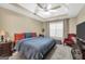 Serene main bedroom with a tray ceiling, a large window, and soft carpet at 1335 Vine Cir, Mcdonough, GA 30253