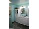 Bathroom features a double vanity and ample storage at 565 Scarborough Rd, Ellenwood, GA 30294