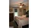 Spacious bedroom featuring a tall dresser and a large window for ample natural light and outdoor views at 565 Scarborough Rd, Ellenwood, GA 30294