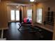 Home gym with a variety of equipment, including weights, punching bag and exercise balls at 24317 Plantation Ne Dr, Atlanta, GA 30324