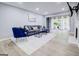 Inviting living room featuring a fireplace, large windows, and sleek, contemporary furnishings at 24317 Plantation Ne Dr, Atlanta, GA 30324