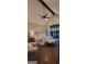 Relaxing main bedroom with large window, vaulted ceilings, ceiling fan, and neutral tones at 251 Merrell Rd, Carrollton, GA 30116