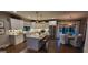 Bright, eat-in kitchen with stainless steel appliances and a large island at 251 Merrell Rd, Carrollton, GA 30116