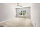 Bright carpeted bedroom with natural light and neutral paint at 3725 Downing Dr, Cumming, GA 30040