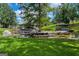 Picturesque view of private boat docks along a serene lakefront with lush greenery at 50 Birch Road, Covington, GA 30014