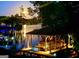 Picturesque lake view with a boat dock, perfect for waterfront living at 50 Birch Road, Covington, GA 30014