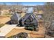 Stunning lakefront home with lush landscaping, two-car garage and beautiful water views at 50 Birch Road, Covington, GA 30014