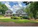 Beautiful front exterior with manicured landscaping, complemented by a detached garage at 50 Birch Road, Covington, GA 30014