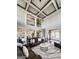 Elegant living room with hardwood floors, soaring ceilings, open floor plan, and modern finishes at 50 Birch Road, Covington, GA 30014