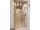 Beautiful glass shower with dual shower heads and a built-in seat at 50 Birch Road, Covington, GA 30014