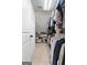 Spacious walk-in closet with carpet, shelving, and plenty of room for hanging clothes and storing shoes at 50 Birch Road, Covington, GA 30014