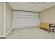 Basement featuring built in shelving and a small table and chair at 118 Whitfield Run, Peachtree City, GA 30269
