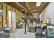 Unfinished basement for storage and projects featuring exposed ceiling and cement flooring at 118 Whitfield Run, Peachtree City, GA 30269