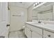 Bathroom featuring white vanity, sink, mirror, and shower/tub combo at 118 Whitfield Run, Peachtree City, GA 30269