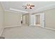 Spacious main bedroom features a trey ceiling with ceiling fan and several closets at 118 Whitfield Run, Peachtree City, GA 30269