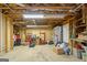 Unfinished basement with exposed wooden ceiling beams, and electrical components at 1290 Shadowlawn Ne Dr, Conyers, GA 30012