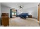 Cozy bedroom with natural light, a ceiling fan, and neutral tones for a comfortable feel at 1290 Shadowlawn Ne Dr, Conyers, GA 30012
