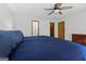 Bedroom featuring carpet, access doors, and a full-size bed with navy blue bedding at 1290 Shadowlawn Ne Dr, Conyers, GA 30012