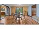 Bright dining room with a glass table, natural light, and decorative details at 1290 Shadowlawn Ne Dr, Conyers, GA 30012