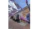 A vibrant downtown scene with patriotic banners and a mural that reads 