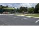 A community playground area surrounded by parking spaces, offering a safe and fun place for families to enjoy outdoor recreation at 1290 Shadowlawn Ne Dr, Conyers, GA 30012