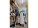 Photo of walk-in closet with shelving, storage boxes and clothes at 1290 Shadowlawn Ne Dr, Conyers, GA 30012