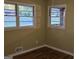 Bright bedroom with hardwood floors and ample natural light from windows at 655 Shellnut Dr, Forest Park, GA 30297