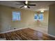 Spacious bedroom with hardwood floors and natural light from the windows at 655 Shellnut Dr, Forest Park, GA 30297