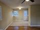 Dining area with hardwood floors and natural light entering from the windows at 655 Shellnut Dr, Forest Park, GA 30297