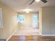Inviting dining area with a ceiling fan and a seamless transition to the living room at 655 Shellnut Dr, Forest Park, GA 30297