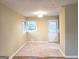 Bright dining room with tile flooring, natural light, and easy access to the backyard at 655 Shellnut Dr, Forest Park, GA 30297