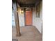 Inviting front entrance featuring a classic door with decorative glass and a sturdy wooden porch at 655 Shellnut Dr, Forest Park, GA 30297