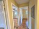 Hallway views into bedrooms with hardwood flooring, doors, and neutral color schemes at 655 Shellnut Dr, Forest Park, GA 30297