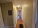 Hallway with hardwood floors leads to other areas of the home, providing smooth transitions at 655 Shellnut Dr, Forest Park, GA 30297