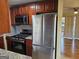 Updated kitchen featuring stainless-steel appliances and eat-in area off to the side at 655 Shellnut Dr, Forest Park, GA 30297
