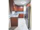 Well-lit kitchen featuring stone countertops, stainless steel appliances and light gray subway tile at 655 Shellnut Dr, Forest Park, GA 30297