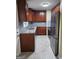 Updated kitchen featuring modern stainless-steel appliances, and granite countertops at 655 Shellnut Dr, Forest Park, GA 30297