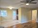 Open-concept living area seamlessly blending into the kitchen, offering versatile living at 655 Shellnut Dr, Forest Park, GA 30297
