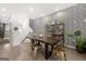 Contemporary dining room featuring stylish wallpaper, wood floors, and modern furniture at 383 Pratt Dr # 506, Atlanta, GA 30315