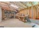 Unfinished basement area with exposed wood framing and ample storage space at 119 Creekside Vw, Hiram, GA 30141