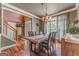 Beautiful dining room featuring hardwood floors, a rustic table, and plenty of natural light at 119 Creekside Vw, Hiram, GA 30141